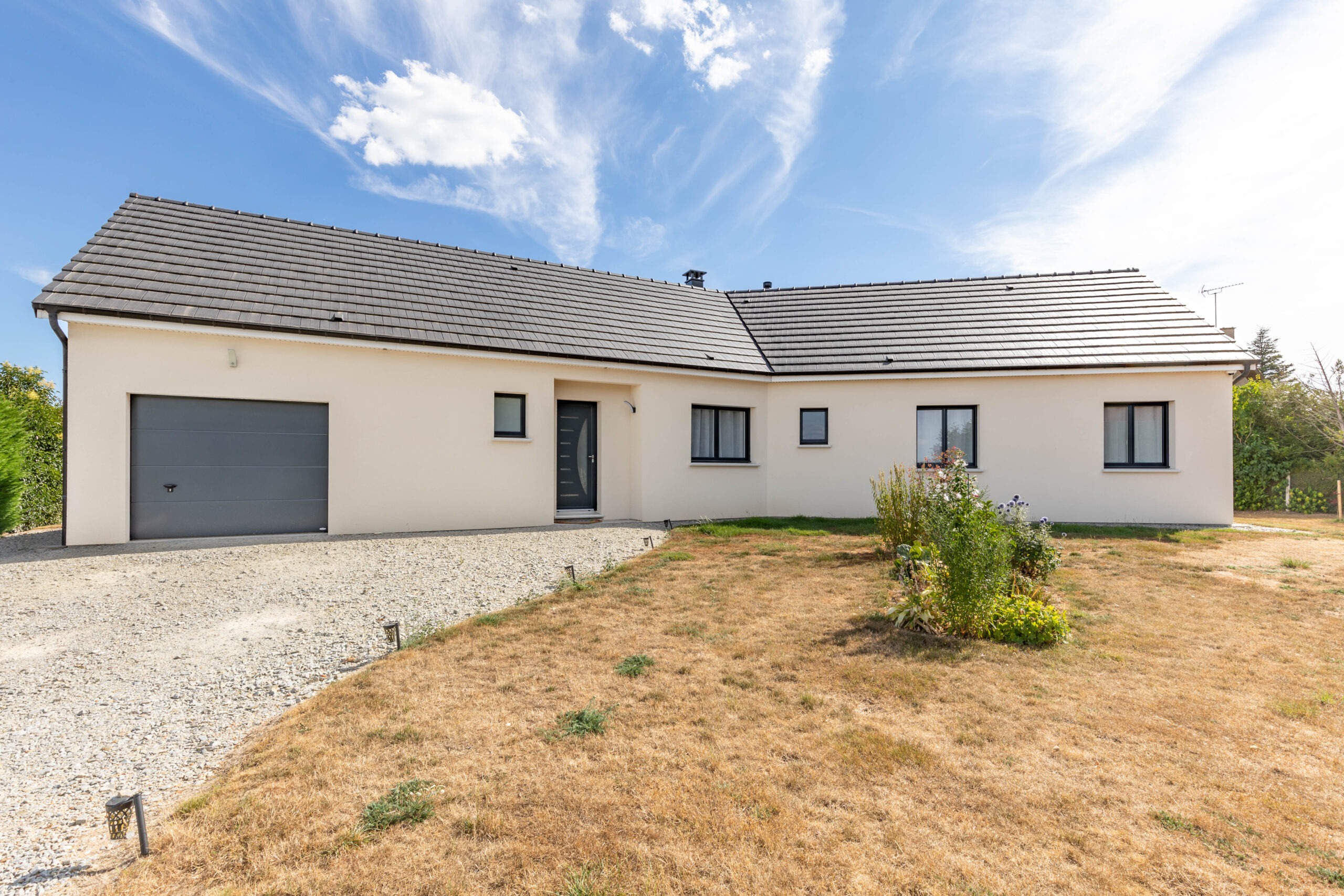 Maison de plain pied avec pan cassé