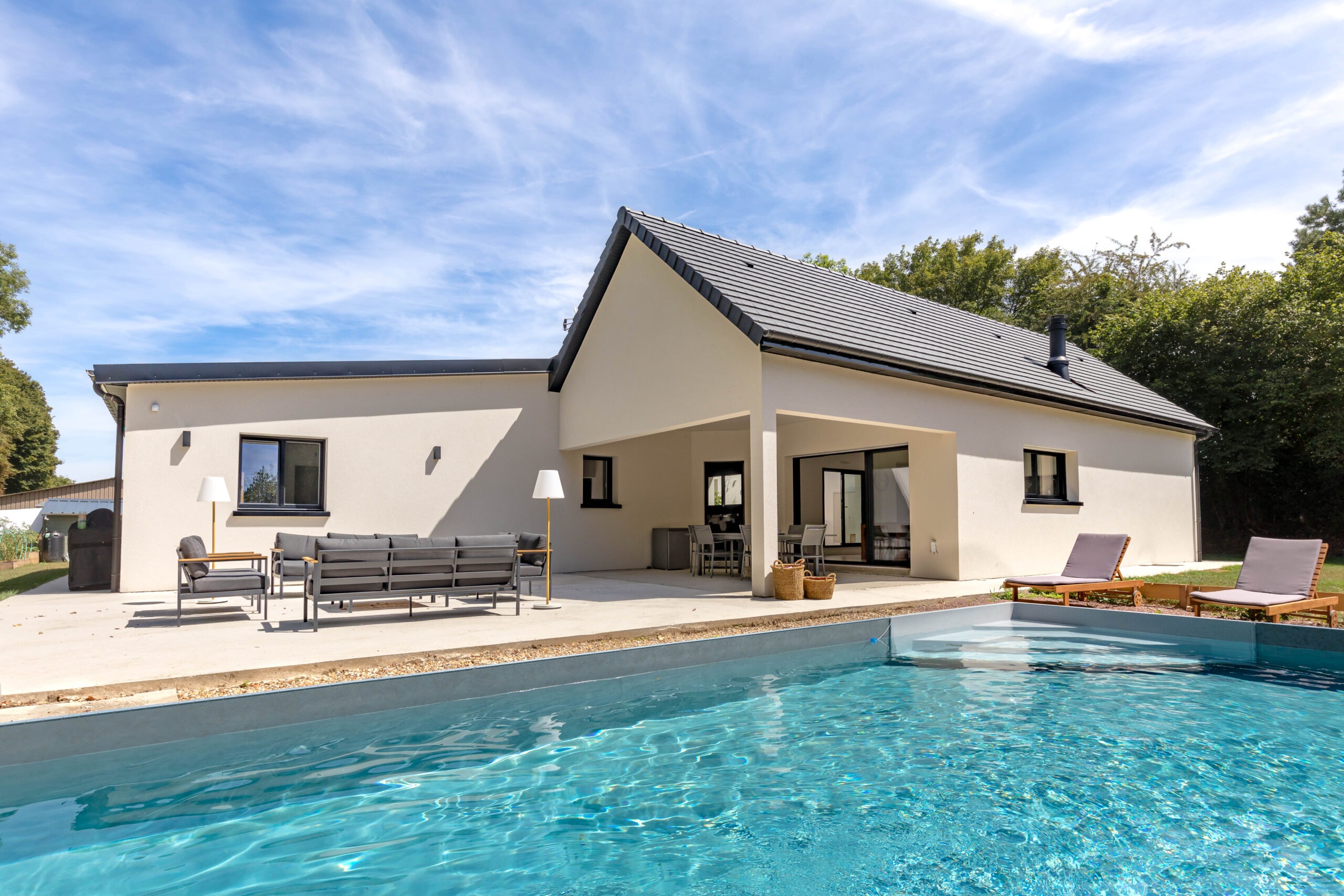 Maison de plain pied avec terrasse couverte